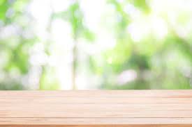 Empty Wooden Table With Defocus Nature Green Bokeh Abstract Nature Background Stock Photo