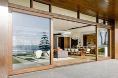 French doors bring an elegant, traditional style to your space, with panes of glass to allow light to filter through from the rooms they connect. 23 Timber Sliding Doors Ideas Timber Sliding Doors Patio Doors Sliding Doors