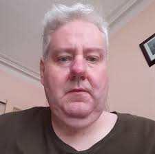 A leading unit in charge.Logical seems to me that it is the closest unit to  the enemy that will be the target. But it doesnt say exactly in the rules.  So in