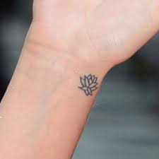 Pin By Jessica Mckee On Tattoos Of Famous Flower Wrist Tattoos Small Wrist Tattoos Cute Little Tattoos