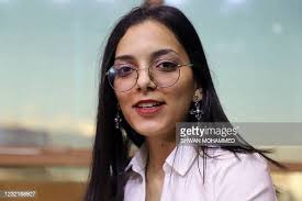 Rawan Salim, an 18-year-old activist, poses for a picture during an... News  Photo