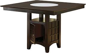 This counter height dining table makes a welcoming eating area with extra storage space on the side. Amazon Com Gabriel Counter Height Dining Table With Storage Pedestal Base Cappuccino Tables