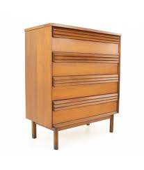 This amish dresser is available in your choice of oak wood, cherry wood, or brown maple wood with a wide variety of finish options! Bassett Mid Century Louvered Walnut 4 Drawer Highboy Dresser