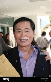 Actor George Takei (R) his partner Brad Altman arrive at the 81st Academy  Awards in Hollywood