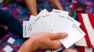 Each round, one player asks a question from a black card and everyone else answers with their funniest white card. The Humans Behind Cards Against Humanity Inc Com