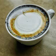 Paper Moon Latte Special For The Solar Eclipse Turmeric And Charcoal Join Together To Create This Total Latte Eclipse Solarecl Turmeric Latte Latte Turmeric