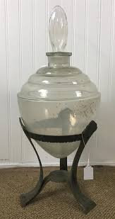 Glass jar is dishwasher safe; Lot Vintage Glass Apothecary Jar With Glass Stopper In Cast Metal Stand Measuring 22 To Top Of Finial Broken And Damaged Stopper