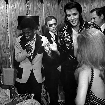 Sammy Davis Jr. visiting Elvis Presley backstage at the Showroom International Hotel in Las Vegas, 1970. Sammy later shared in his two autobiographies, Yes I Can (1965) and Hollywood in a Suitcase (1980),