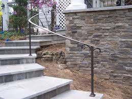 Outdoor concrete staircase with stainless steel handrail. Exterior Curved Wrought Iron Handrails Railings Outdoor Wrought Iron Stair Railing Iron Handrails