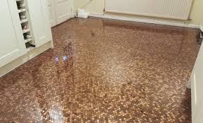 man tiles kitchen floor with 27,000
