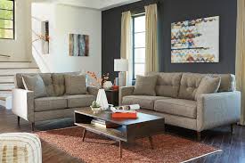 Square wooden coffee table for contemporary indoors. Sofa Vs Sectional Buying Guide Hom Furniture