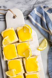 Lemon Cheesecake Bars With Lemon Curd Cheesecake Lemon Bars With Graham Cracker Crust Are A Fun Easy S Lemon Cheesecake Bars Lemon Cheesecake Cheesecake Bars
