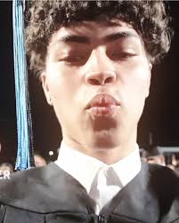 Chris Graduates High School