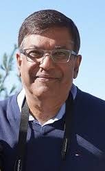 The exemplary volunteer service and dedication of Nazir Nensi to the Jamat  and Mawlana Hazar Imam, and two cherished photos with the Imam