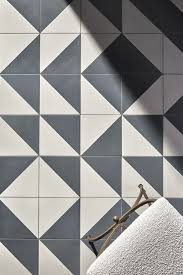 Geometric Tiles Used To Create A Unique Geometric Bathroom Tile Floor From Our Promenade C Geometric Tiles Bathroom White Bathroom Designs Bathroom Floor Tiles