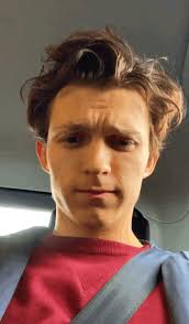 Tom Holland playing with his hair for 30 whole seconds.