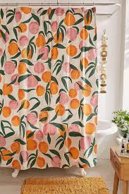 This shower curtain from society6 is designed with oranges and botanicals for a cheerful look that'll brighten up even the drabbest of bathrooms. Orange Pink Peaches Shower Curtain