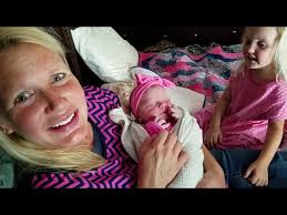 Catching their first glimpses of Destiny Faith Waller, Paul, Davia, and  Phillip are elated