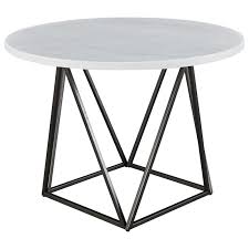 The heart of your entertaining ensemble isthe heart of your entertaining ensemble is your dining table. Steve Silver Ramona Contemporary White Marble Top Round Dining Table Standard Furniture Dining Tables
