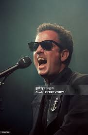 Photo taken 13 May 1990 in Paris of US singer Billy Joel performing... News  Photo