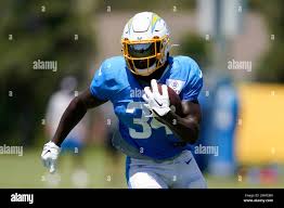 Los Angeles Chargers running back Larry Roundtree III (34) participates in  drills during a combined NFL practice with the Dallas Cowboys at the Los  Angeles Rams' practice facility in Costa Mesa, Calif.