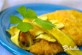 Il pollo in carpione è una gustosa variante della preparazione tradizionale del carpione, caratterizzata dal sapore forte dell'aceto. Carpione Di Pollo E Zucchine