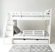 The bed is made out of bright solid wood and has a set of six drawers on the side as well as additional ones inside of the stairs. Bunk Bed With Staircase Single Piccolo House Asia