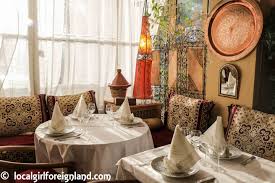 Luxurious furnishings and fabrics all moroccan furniture, from sofas, pouf seating, ottomans, and decorative handcarved wood tables, sit low to the ground to promote comfort and repose. Le Caroubier A Moroccan Dining Experience In Paris Local Girl Foreign Land