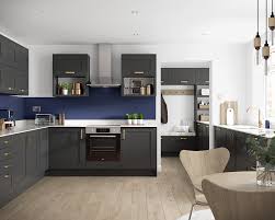 Grey, glossy, and lightweight, these slab doors are a stylish and versatile choice that will complement any decor, whilst creating a light and bright feel. Oxford Slate Grey Benchmarx Kitchens Joinery