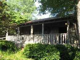 Dolly Parton S Childhood Home Re Created In Dollywood Home Re House Styles Dolly Parton A hallway several feet wide runs along the cabin's interior, and a wooden fence and. dolly parton