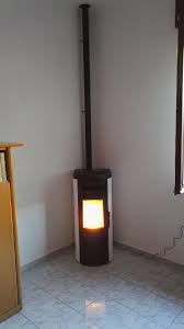 Connessione via internet, policombustibili, plug play, efficienza, confort, affidabilità,. Installazione Canna Fumaria Per Stufa A Pellet Marchio Ravelli Canegrate Milano Paganini Graziano