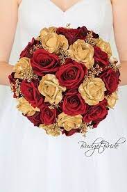 Maybe you would like to learn more about one of these? Red Roses And Gold Roses Gold Glitter Roses And Golden Berries Round Brides Bouquet Great For A Gold Wedding Flowers Beauty And Beast Wedding Red Gold Wedding