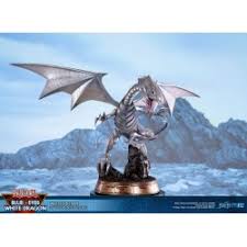 Yugioh began back in the mid 90's as a weekly short in shonen jump by 1999 the tcg game had launched in japan. Blue Eyes White Dragon Silver Standard Edition Yu Gi Oh First 4 Figures