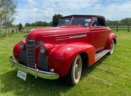 Image result for Trojan Maroon 1939 Oldsmobile