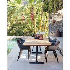 Rio Teak Outdoor Table Reviews Cb2 In 2020 Modern Outdoor Dining Resin Patio Furniture Outdoor Dining Room