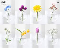 the kaki flower vase was born from the simple idea of wanting to create a flower vase that could be flower vases floating flowers floating flower arrangements