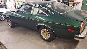 Image result for Dark Yellow 1976 Vega