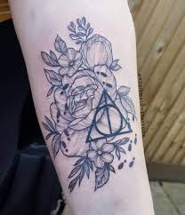 Harry potter flowers and plants. I Tattooed These Flowers With A Hint Of Harry Potter Over Some Scarring A Little While Back Instagram Rosiemalonetattoos Harrypotter