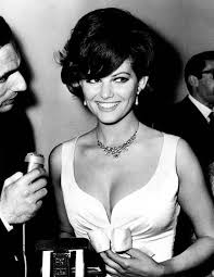 Claudia Cardinale flashing a big smile - and why not?