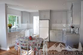 I chose pebble grey from kraftmaid. Pebble Gray Kitchen Stone Ridge Cabinets
