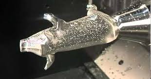 Cnc 5axis Subtractive Technology Cutter Removes Material From Large Block Lots Of Waste High Precision Alu Schwein Euromold Hsc Pokolm 5 Axis Schwein