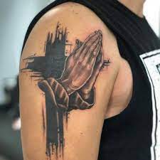 These tattoos on arms represent the process of praying with a the black touches around the central pattern embody the jesus' presence near the person. 37 Cool Praying Hands Tattoo Designs With Meanings Body Art Guru