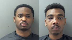 Two arrests made in shooting death of store clerk during robbery, police  chief says