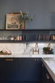 Matte black oversized utensils wall art. Railings