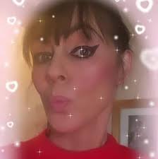 Baby seagull is stuck in a gutter in flats opposite our house un able to  fly or climb the roof is there anyone I could call to maybe help it ?