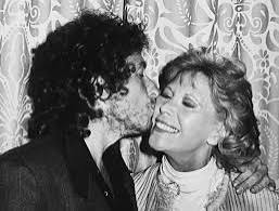 Bob and Dinah Shore. These photos were taken at the New York Hilton on the  night of Dylan's induction into the Songwriters Hall of Fame in 1982.  According to Randy Poe, former