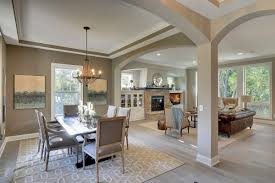 The house has a living room and a dining room. Open Floor Plan Coyote Song Model Fall Parade 2014 Transitional Dining Room Minneapolis By Gonyea Custom Homes Houzz