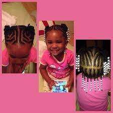Cute Little Girl Hairstyle Braided Into Two Ponytails At The Top And One Layer Braided Half Bun Hairstyles Cute Little Girl Hairstyles Little Girl Hairstyles