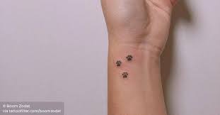 Wrist tattoos are one of the most unique tattoos. Small Dog Paw Tattoos On The Wrist
