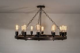 16 Amazing Wood Wagon Wheel Chandeliers Id Lights